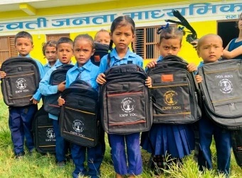 Nepali-children-receive-backpacks